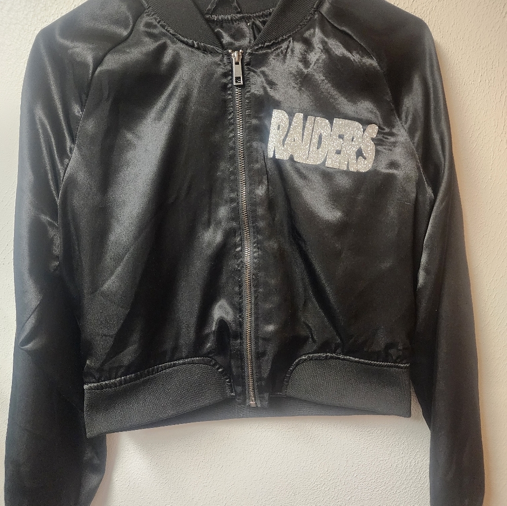 Black Las Vegas Raiders custom made jacket, the jacket is a size Small in kids